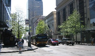 Once again I suffered bad bus karma--here the No. 43 pulls away from the bus stop as I stand yards away waiting to cross the intersection.